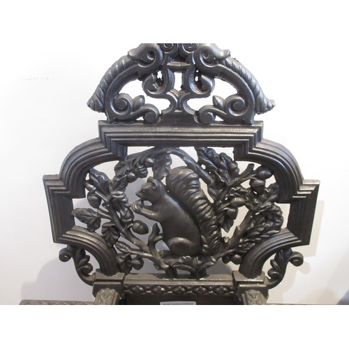 764 - A cast iron Stick Stand with pierced surmount of a squirrel  and foliage, 2ft 7in H