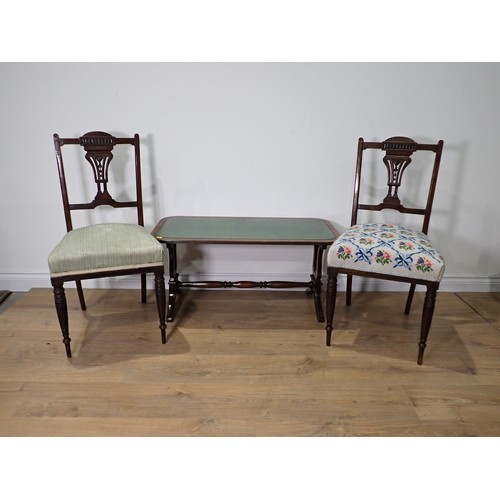 50 - A pair of Victorian walnut Bedroom Chairs and a mahogany veneered Coffee Table