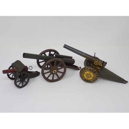 1117 - A Burnett tinplate Field Gun, another tinplate Field Gun and a Marx Field Gun