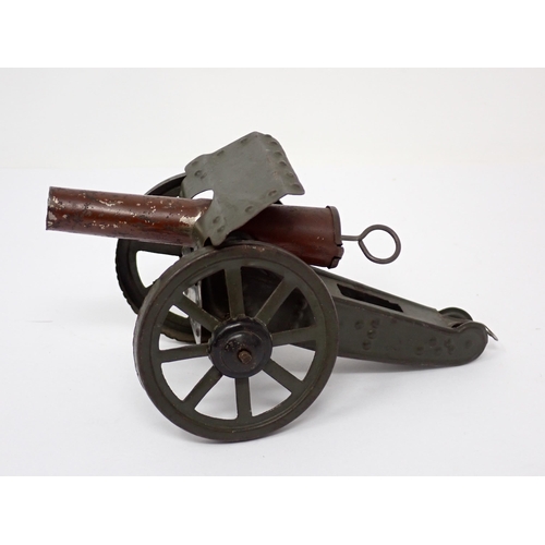 1117 - A Burnett tinplate Field Gun, another tinplate Field Gun and a Marx Field Gun