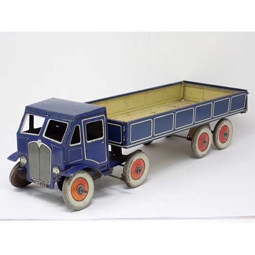 1122 - A Mettoy tinplate clockwork Lorry and Trailer