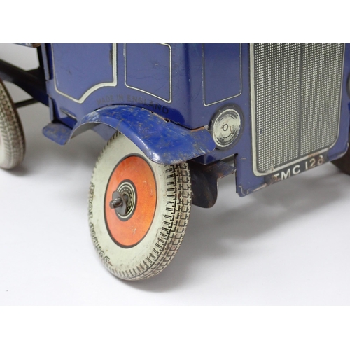 1122 - A Mettoy tinplate clockwork Lorry and Trailer