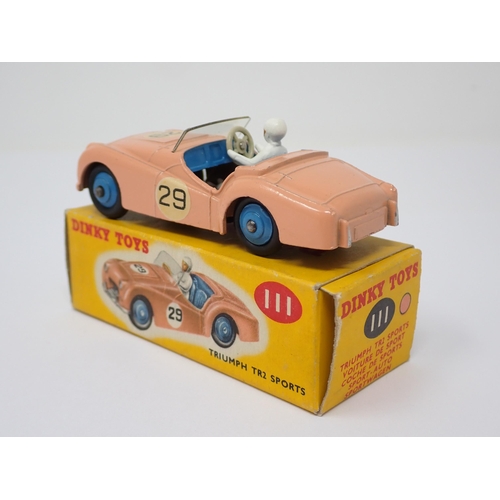 1137 - A boxed Dinky Toys No.111 pink Triumph TR2 Sports