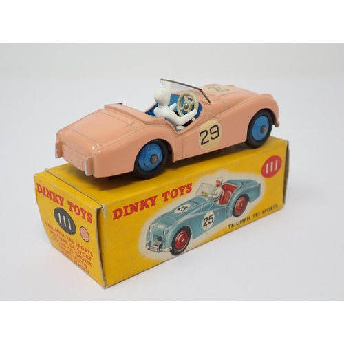 1137 - A boxed Dinky Toys No.111 pink Triumph TR2 Sports