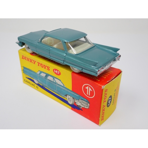 1139 - A boxed Dinky Toys No.147 metallic turquoise Cadillac 62