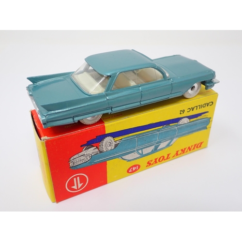 1139 - A boxed Dinky Toys No.147 metallic turquoise Cadillac 62