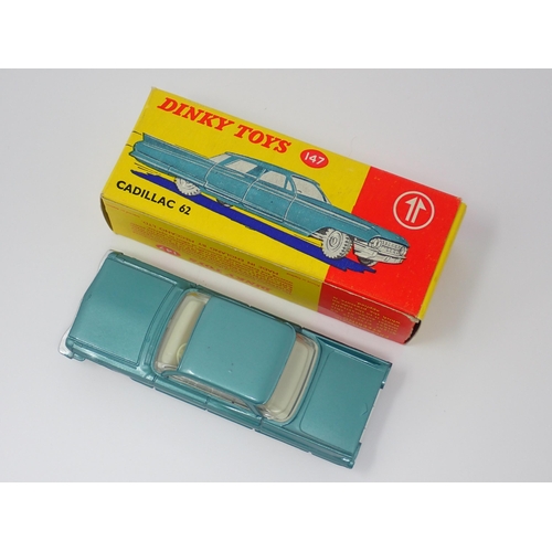 1139 - A boxed Dinky Toys No.147 metallic turquoise Cadillac 62