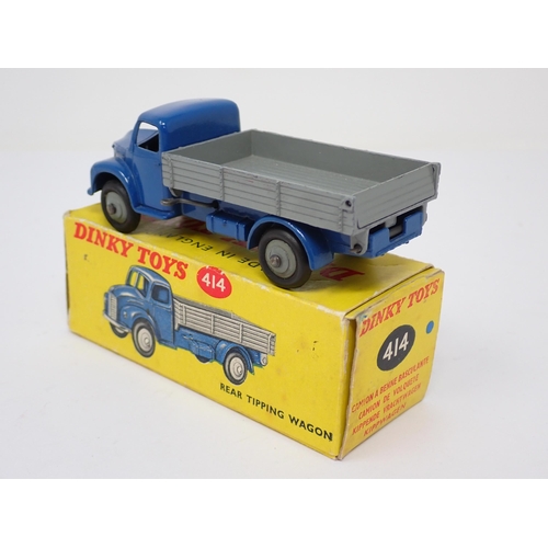 1147 - A boxed Dinky Toys No.414 blue and grey rear tipping Lorry