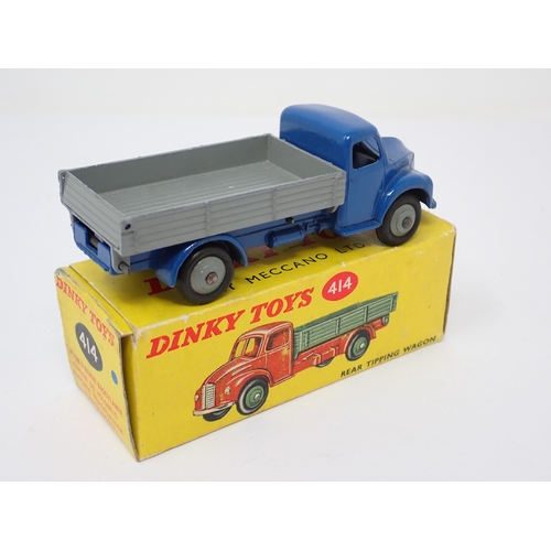 1147 - A boxed Dinky Toys No.414 blue and grey rear tipping Lorry