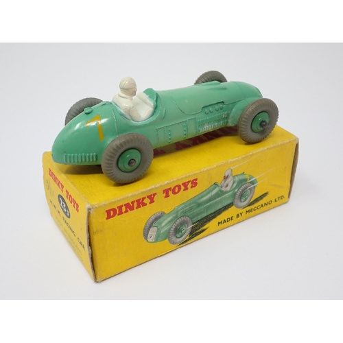 1159 - A boxed Dinky Toys No.23J H.W.M. Racing Car stamped 23J to base