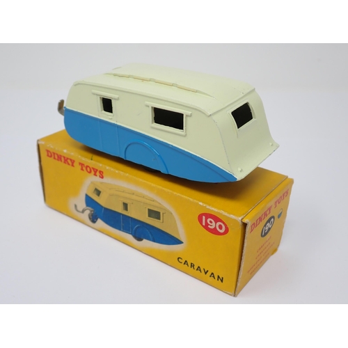 1167 - A boxed Dinky Toys No.190 blue and cream Caravan with packing piece