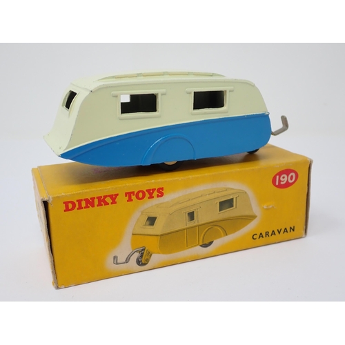 1167 - A boxed Dinky Toys No.190 blue and cream Caravan with packing piece