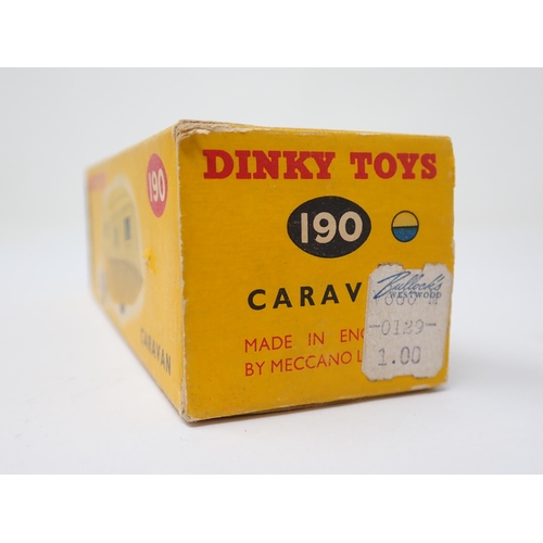 1167 - A boxed Dinky Toys No.190 blue and cream Caravan with packing piece