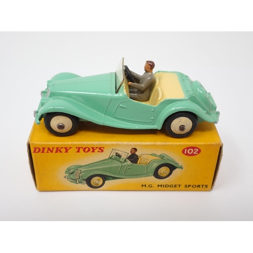 1176 - A boxed Dinky Toys No.102 green MG Midget