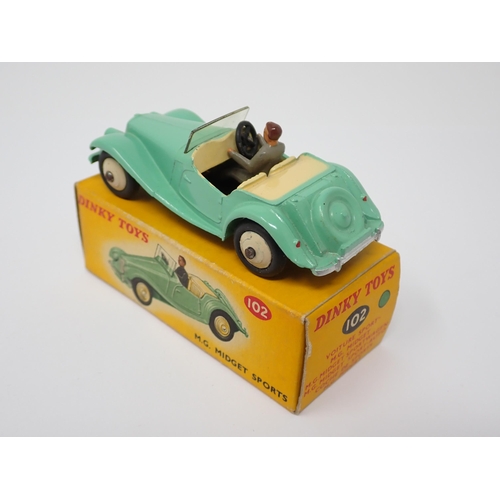 1176 - A boxed Dinky Toys No.102 green MG Midget