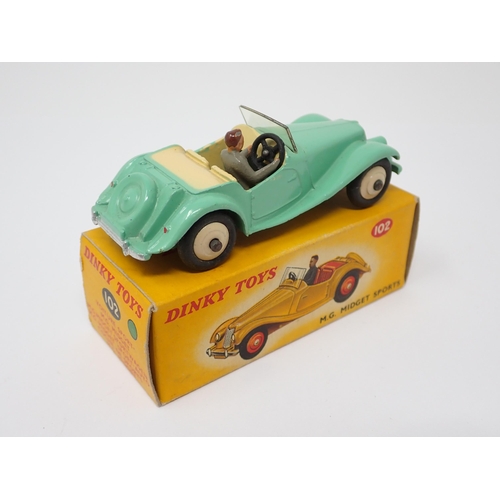 1176 - A boxed Dinky Toys No.102 green MG Midget