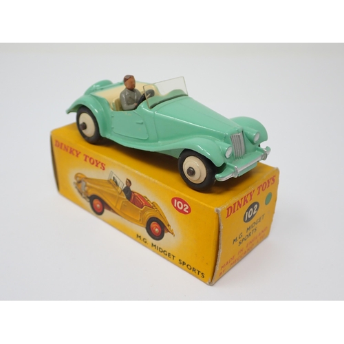 1176 - A boxed Dinky Toys No.102 green MG Midget