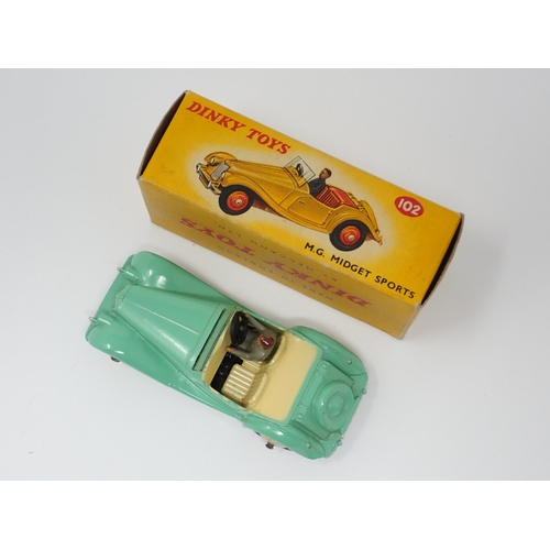 1176 - A boxed Dinky Toys No.102 green MG Midget