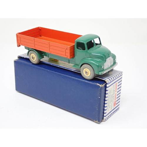 1177 - A boxed Dinky Toys No.932 orange and green Comet Lorry