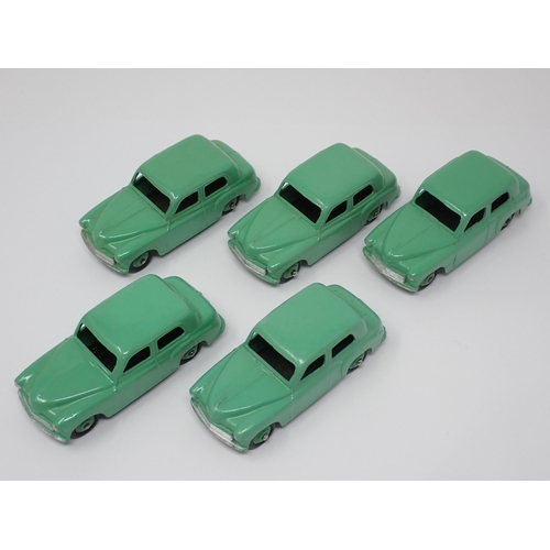 1184 - A Dinky Toys Trade Box containing five No.40F green Hillman Minx