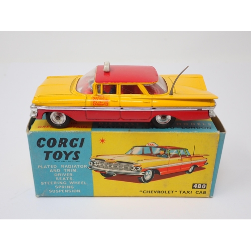 1205 - A boxed Corgi Toys No.480 Chevrolet Taxi Cab with packing