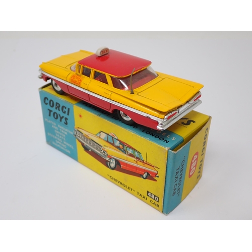 1205 - A boxed Corgi Toys No.480 Chevrolet Taxi Cab with packing