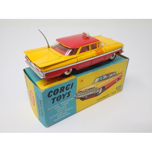 1205 - A boxed Corgi Toys No.480 Chevrolet Taxi Cab with packing