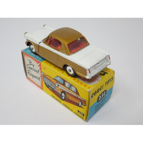 1206 - A boxed Corgi Toys No.231 gold and white Triumph Herald