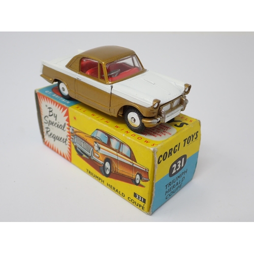 1206 - A boxed Corgi Toys No.231 gold and white Triumph Herald