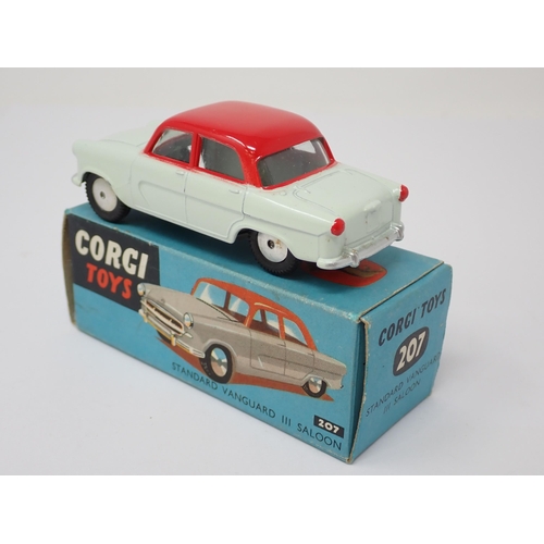 1209 - A boxed Corgi Toys No.207 white and red Standard Vanguard Saloon