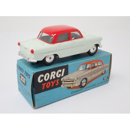 1209 - A boxed Corgi Toys No.207 white and red Standard Vanguard Saloon