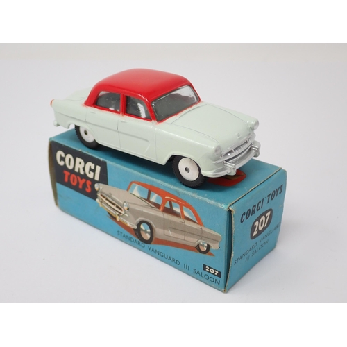 1209 - A boxed Corgi Toys No.207 white and red Standard Vanguard Saloon