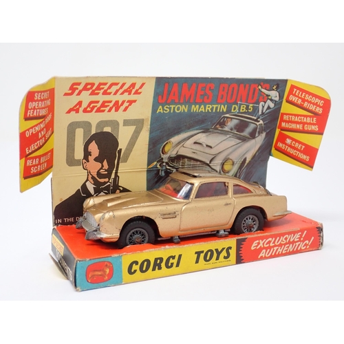 1217 - A boxed Corgi Toys No.261 James Bond Aston Martin D.B.5 complete with documents