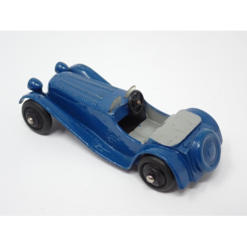 1226 - An unboxed Dinky Toys No38F dark blue Jaguar SS100