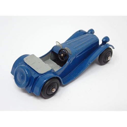 1226 - An unboxed Dinky Toys No38F dark blue Jaguar SS100