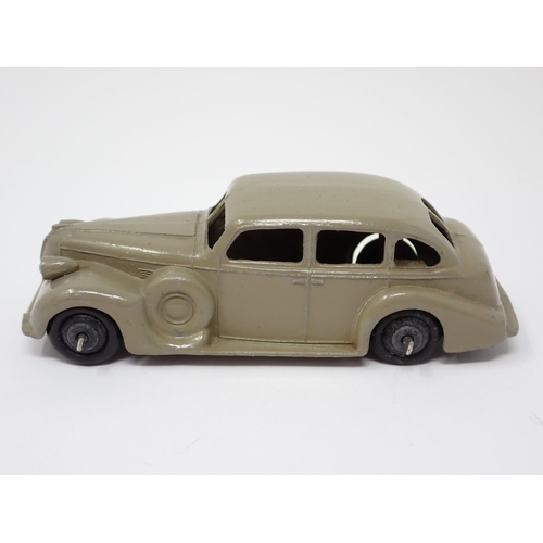 1227 - An unboxed Dinky Toys No.39D fawn Buick