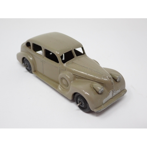 1227 - An unboxed Dinky Toys No.39D fawn Buick