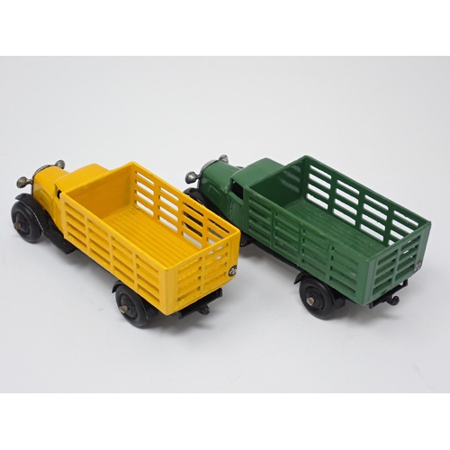 1228 - Two unboxed Dinky Toys No.25F Market Garden Lorries, one green and one yellow