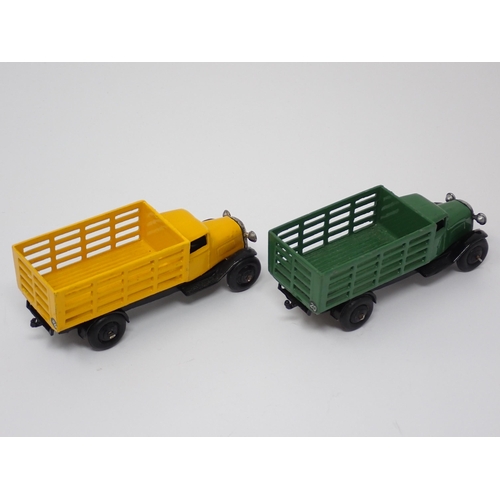 1228 - Two unboxed Dinky Toys No.25F Market Garden Lorries, one green and one yellow