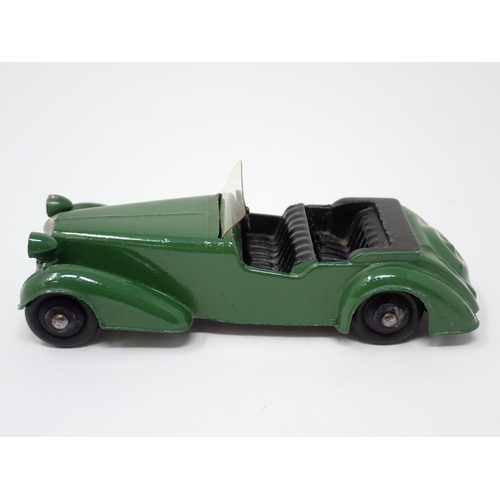 1230 - An unboxed Dinky Toys No.38D green Alvis