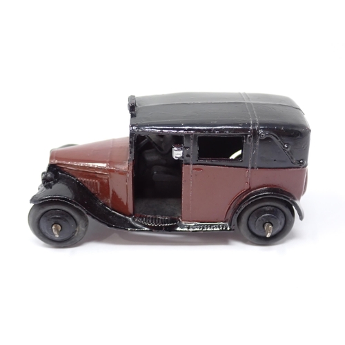 1248 - A Dinky Toys No.36G maroon and black Taxi