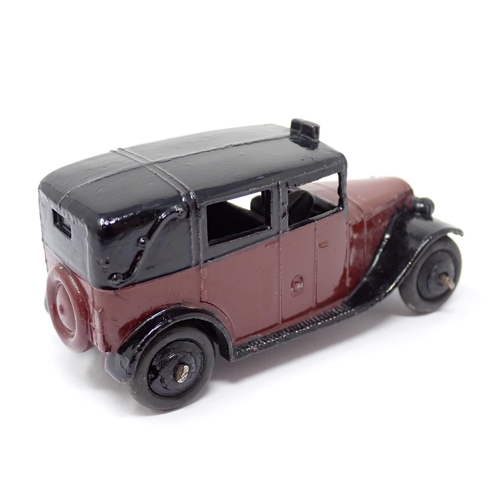 1248 - A Dinky Toys No.36G maroon and black Taxi