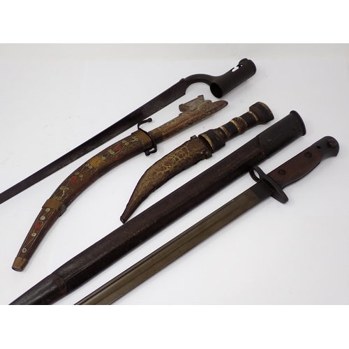 1366 - An SMLE Bayonet, a P.42 Socket Bayonet and two North African Daggers