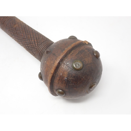 1385 - A late 19th Century South African Knobkerrie with studded head and incised decoration 1ft 8in L