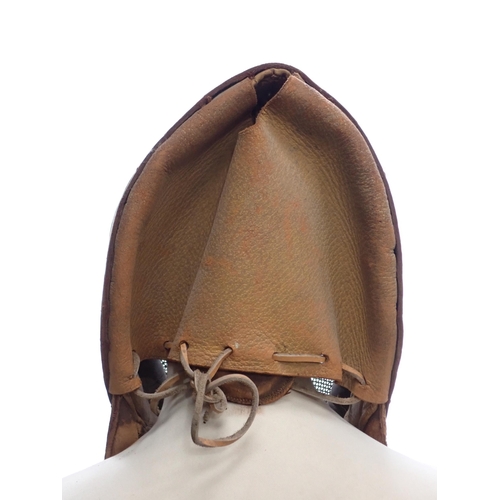 1411 - An early 20th Century Wilkinson Sword Fencing Mask with wire gauze face cover and leather ear guards... 