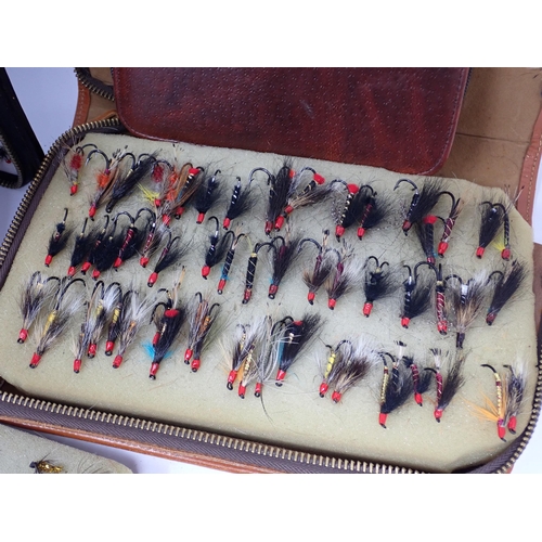 1415 - A collection of assorted Trout and Salmon Flies in various boxes and wallets