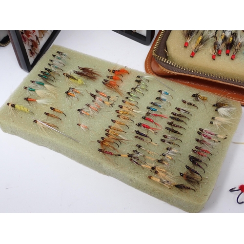 1415 - A collection of assorted Trout and Salmon Flies in various boxes and wallets