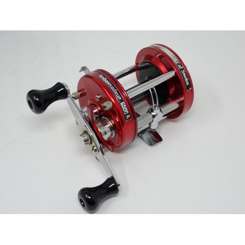 1420 - An Abu Ambassadeur 6500 Multiplier Reel and a boxed Daiwa Millionaire 6HM Multiplier Reel