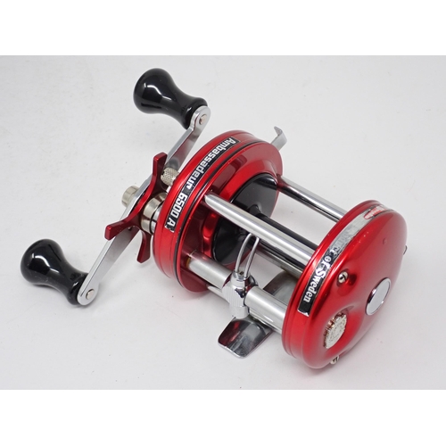 1420 - An Abu Ambassadeur 6500 Multiplier Reel and a boxed Daiwa Millionaire 6HM Multiplier Reel