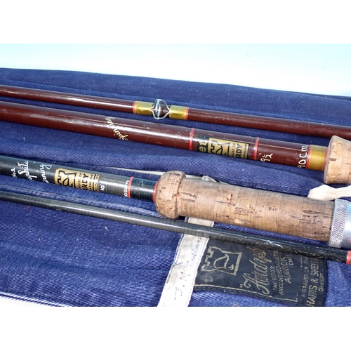 1441 - A Hardy 9ft 6in Fibalite Spinning Rod, a Hardy 10ft Graphite Spinning Rod and a split cane Spinning ... 